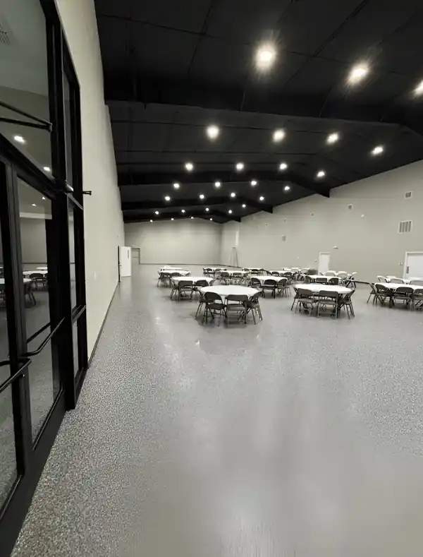 Painted event hall interior with finished walls and trim
